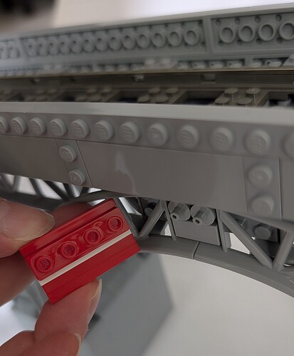 Fixation de briques à base de bracket